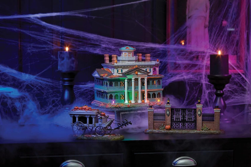 Department 56 Snow Village Halloween Disneyland Haunted Mansion Lit Building. 9.1 Inch. Multicolor